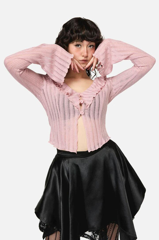 Image of a model wearing Outerwear. Productname: Ladybug Ruffle Cardigan in Pink colour by brand - Dangerfield