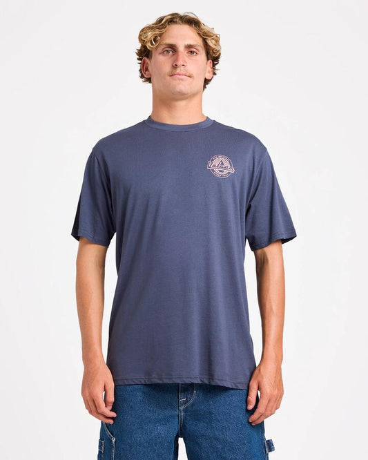 Image of a model wearing Tops. Productname: Volcom Neo Stone Short Sleeve Tee Vintage Navy - in Vintage Navy colour by brand - Volcom