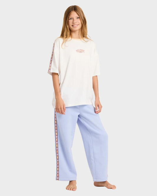 Image of a model wearing Pants. Product name - Billabong Girls 6-16 Old Dayz Trackpants Twilight Blue in Twilight Blue colour by brand - Billabong