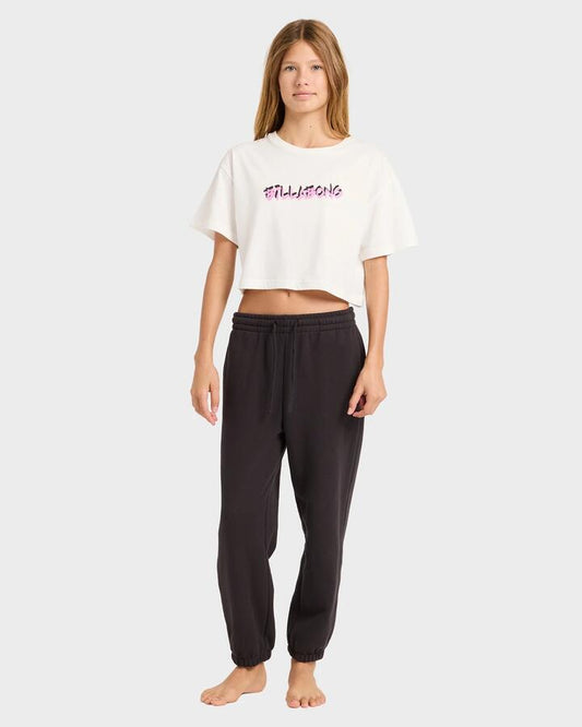 Image of a model wearing Pants. Product name - Billabong Girls 6-16 Paradise Trackpants Off Black in Off Black colour by brand - Billabong