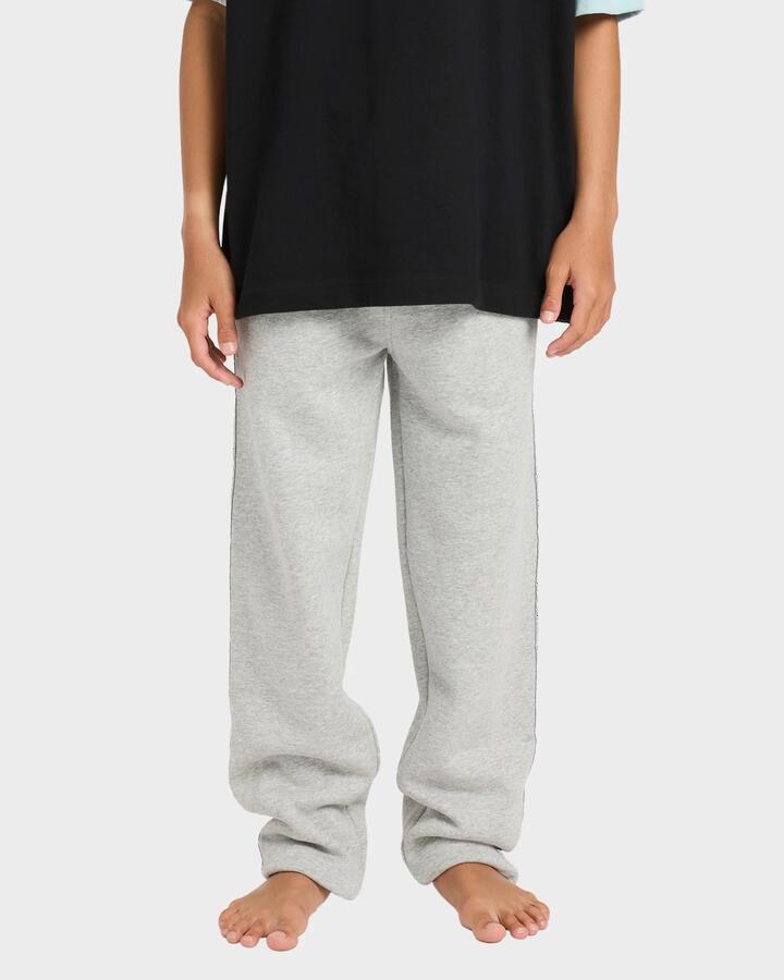 Image of a model wearing Pants. Product name - Billabong Boys 8-16 Spec 73 Trackpants Light Grey Heather in Light Grey Heather colour by brand - Billabong