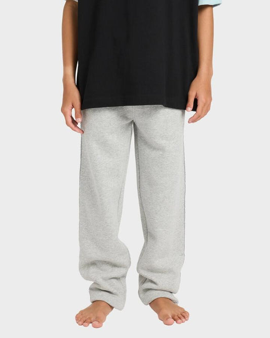 Image of a model wearing Pants. Productname: billabong Boys 8-16 Spec 73 Trackpants Light Grey Heather - in Light Grey Heather colour by brand - Billabong