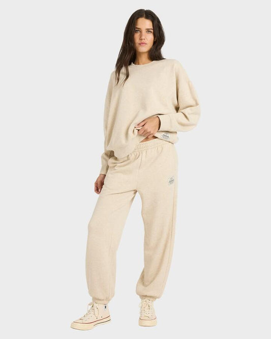Image of a model wearing Outerwear. Productname: billabong - Womens That Life Fleece Sweatpants - Oatmeal - in Oatmeal colour by brand - billabong