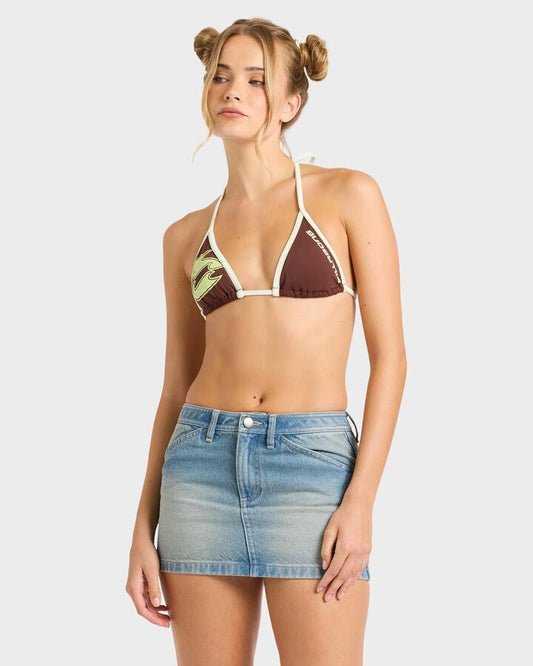 Image of a model wearing Skirts. Productname: billabong Womens Funster Denim Mini Skirt Sun Faded Indigo - in Sun Faded Indigo colour by brand - Billabong