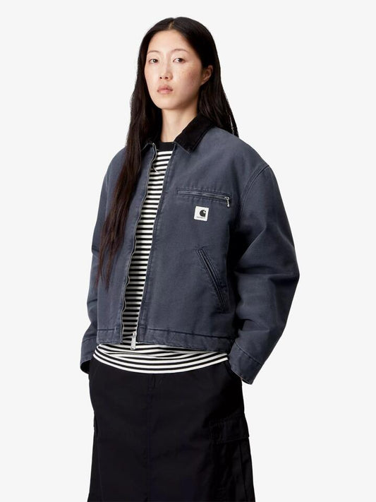 Image of a model wearing Outerwear. Productname: Carhartt Wip Women's OG Detroit Jacket in Dark Navy/Blackstone Canvas colour by brand - Carhartt Wip