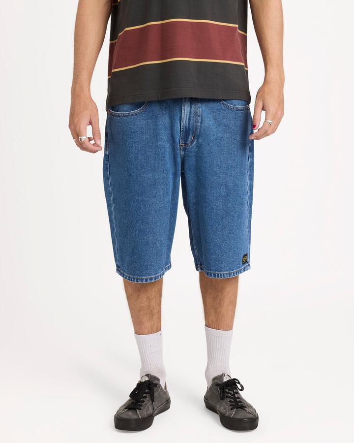 Image of a model wearing Shorts. Product name - RVCA Mens Dayshift Denim Shorts Blue Collar in Blue Collar colour by brand - RVCA