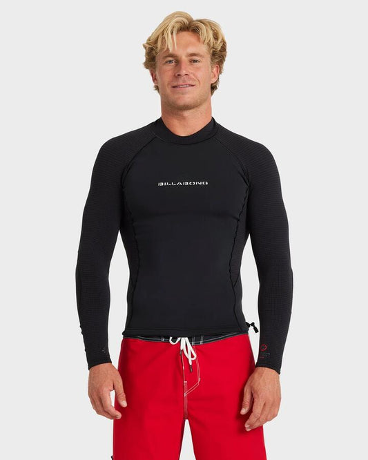 Image of a model wearing Tops. Productname: billabong - Mens 1/1Mm Revolution Long Sleeve Wetsuit Top - Black Red - in Black Red colour by brand - billabong