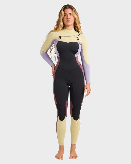 Image of a model wearing Tops. Productname: billabong - Womens 3/2Mm Synergy Natural Chest Zip Steamer Wetsuit - Grey Violet - in Grey Violet colour by brand - billabong