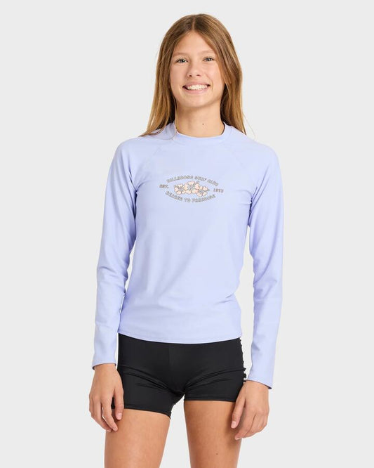 Image of a model wearing Tops. Product name - Billabong Girls 6-16 Surf Club Long Sleeve Rashvest Twilight Blue in Twilight Blue colour by brand - Billabong