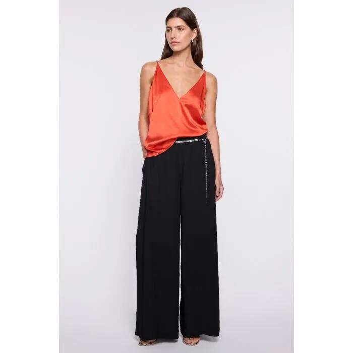 Image of a model wearing Pants. Productname: Attic Pant in Black colour by brand - sass and bide