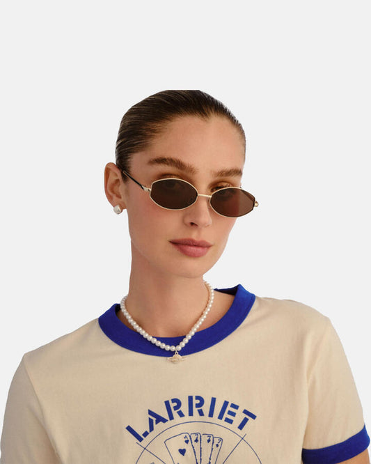 Image of Sunglasses. Productname: Aire Objective Sunglasses: Gold - Women's Sunglasses in Metallic colour by brand - Novo