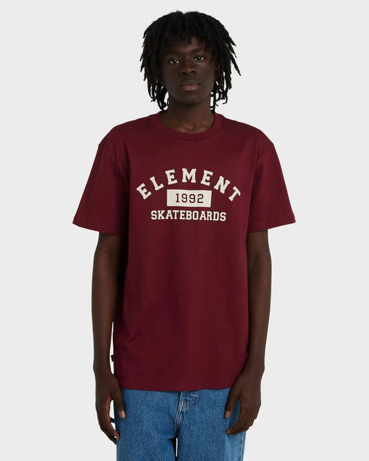 Image of a model wearing Tops. Productname: element Mens Home Team T-Shirt Zinfandel - in Zinfandel colour by brand - Element