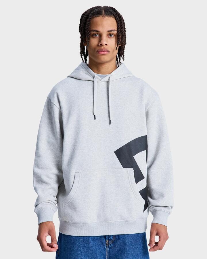 Image of a model wearing Outerwear. Product name - DC Shoes Mens Lanai Pullover Hoodie Light Heather Grey in Light Heather Grey colour by brand - DC Shoes