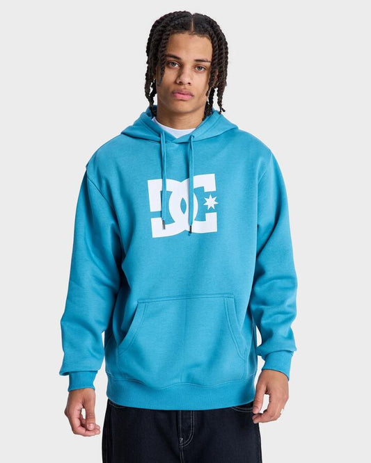 Image of a model wearing Outerwear. Productname: DC Shoes Mens Dc Star Pullover Hoodie Storm Blue - in Storm Blue colour by brand - DC Shoes