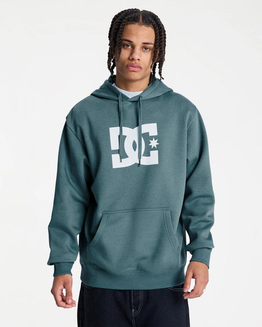 Image of a model wearing Outerwear. Product name - DC Shoes Mens Dc Star Pullover Hoodie Storm Blue in Storm Blue colour by brand - DC Shoes