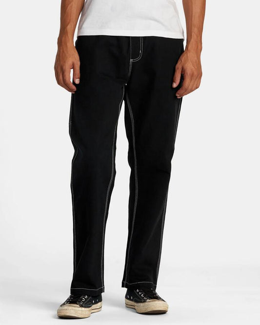 Image of a model wearing Pants. Productname: rvca Mens Americana Carpenter Pants Black - in Black colour by brand - Rvca