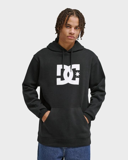 Image of a model wearing Outerwear. Productname: DC Shoes Mens Dc Star Pullover Hoodie Black - in Black colour by brand - DC Shoes