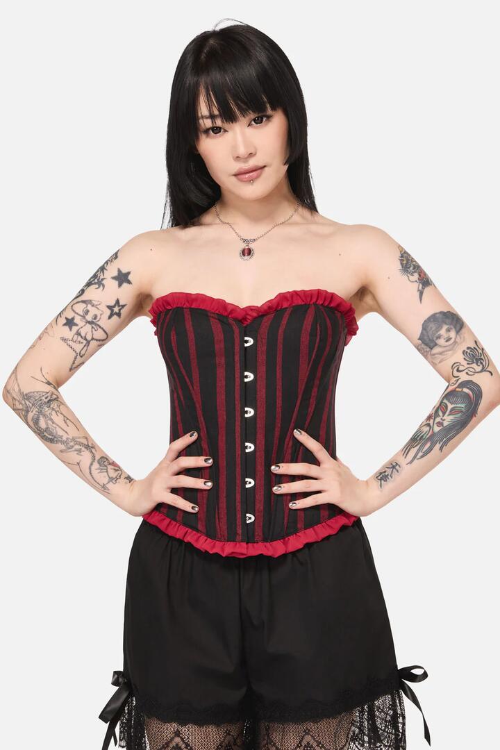 Image of a model wearing Tops. Productname: Ritualistic Goth Corset Top in Red/Black colour by brand - Black Friday