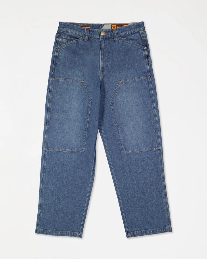 Image of a model wearing Pants. Productname: volcom - Mens Work Carpenter Pants - Park Blue - in Park Blue colour by brand - volcom