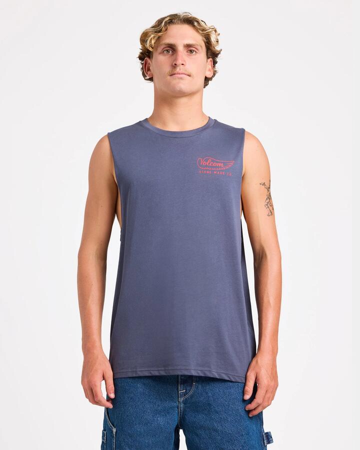 Image of a model wearing Tops. Product name - Volcom Mens Highbird Muscle Tee Vintage Navy in Vintage Navy colour by brand - Volcom