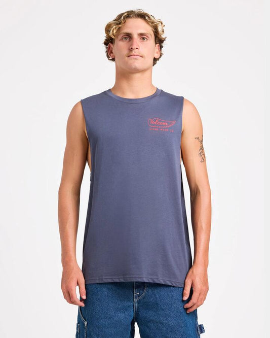 Image of a model wearing Tops. Product name - Volcom Mens Highbird Muscle Tee Vintage Navy in Vintage Navy colour by brand - Volcom