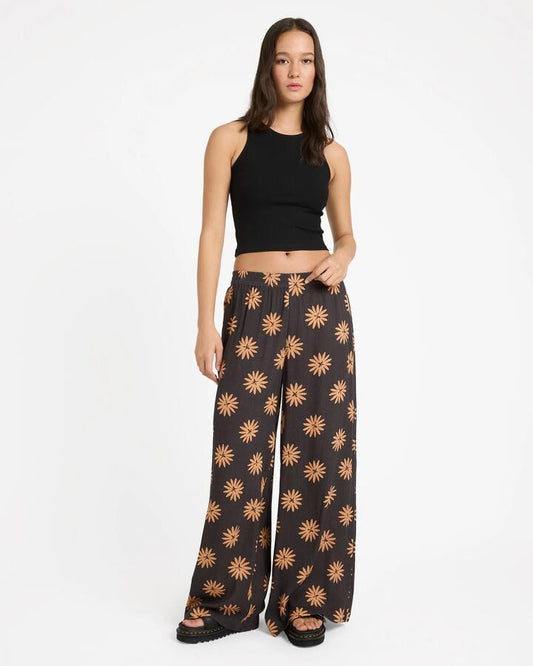 Image of a model wearing Pants. Productname: volcom - Womens Midnite Ramble Pants - Vintage Black - in Vintage Black colour by brand - volcom