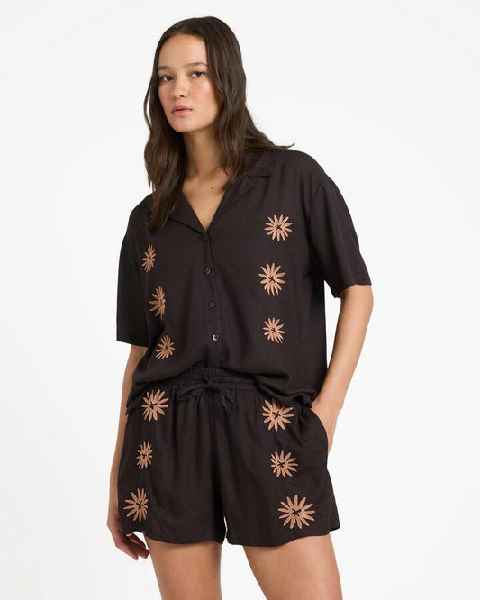 Image of a model wearing Shorts. Productname: volcom - Womens Florez Elastic Waist Shorts - Vintage Black - in Vintage Black colour by brand - volcom