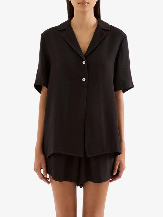 Image of a model wearing Tops. Productname: Nude Lucy Mona Shirt in Black colour by brand - Nude Lucy