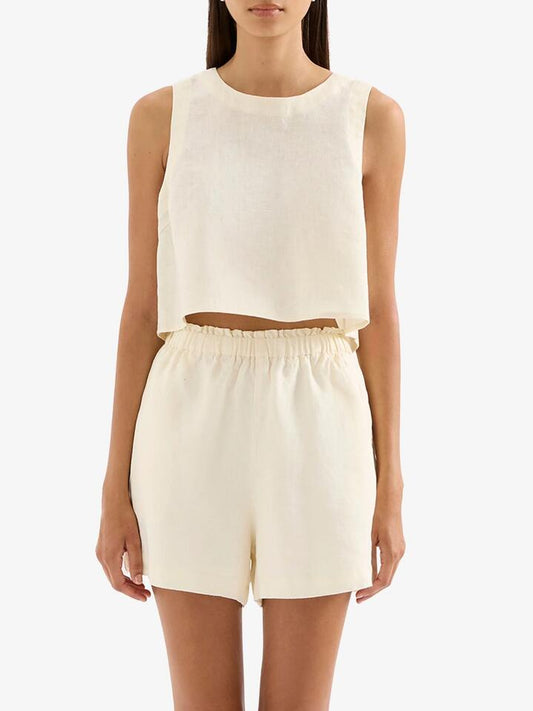 Image of a model wearing Tops. Productname: Nude Lucy Sian Linen Top in Chamomile colour by brand - Nude Lucy