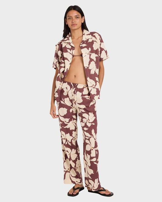 Image of a model wearing Pants. Productname: rvca - Womens Rhi Holiday Pants - Terra Brown - in Terra Brown colour by brand - rvca