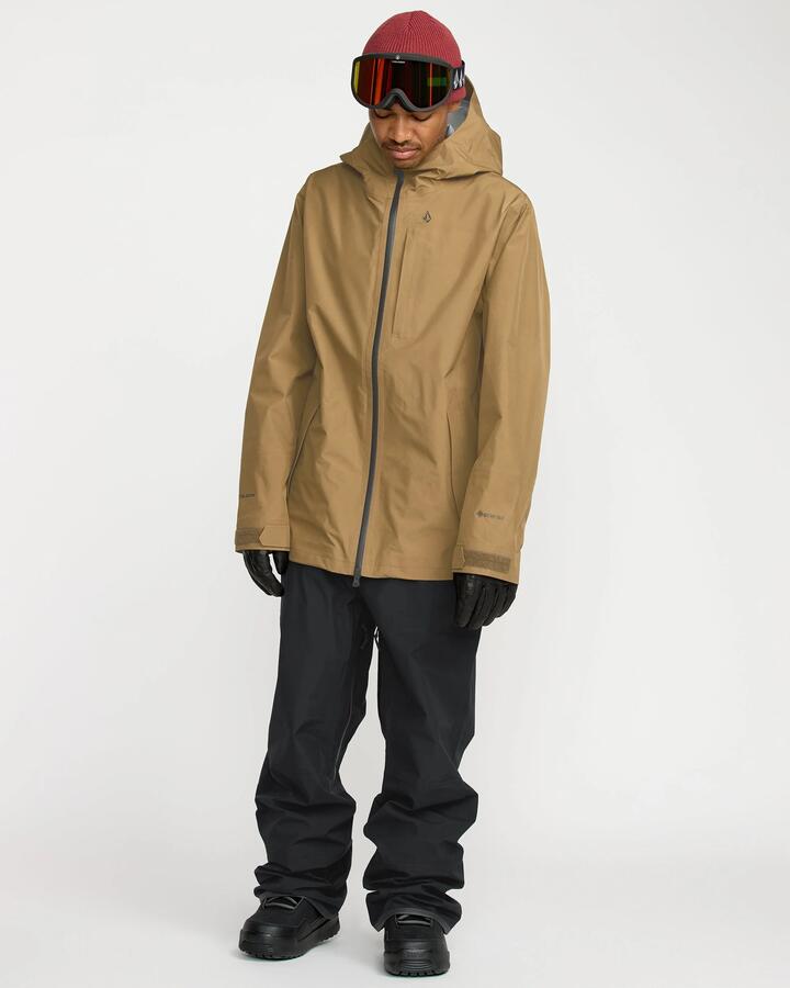 Image of a model wearing Pants. Product name - Volcom Mens Tester 3L Gore-Tex Snow Pants Black in Black colour by brand - Volcom