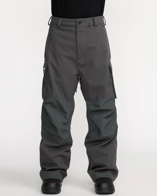 Image of a model wearing Pants. Productname: Volcom - Mens Newark Baggy Snow Pants - Dark Grey - in Dark Grey colour by brand - Volcom