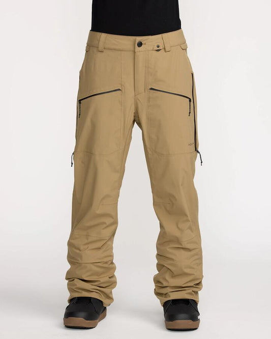 Image of a model wearing Pants. Productname: Volcom - Womens Karat Stretch 30K Snow Pants - Bronze - in Bronze colour by brand - Volcom