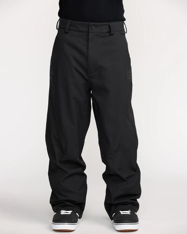 Image of a model wearing Pants. Product name - Volcom Mens Kleveland Snow Pants Black in Black colour by brand - Volcom