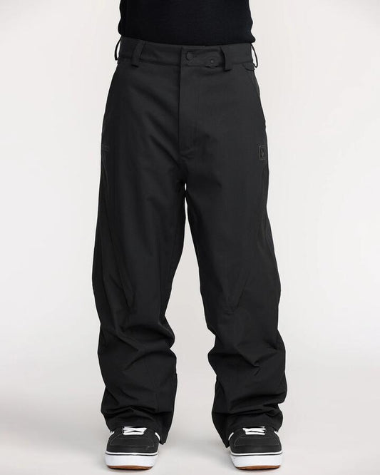 Image of a model wearing Pants. Product name - Volcom Mens Kleveland Snow Pants Black in Black colour by brand - Volcom
