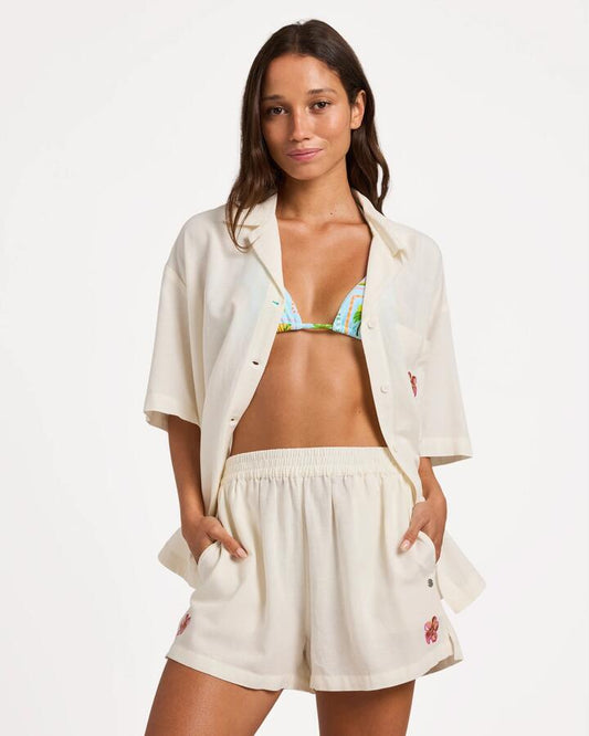 Image of a model wearing Shorts. Product name - Roxy Womens Hibiscus Elastic Waist Shorts Egret in Egret colour by brand - Roxy