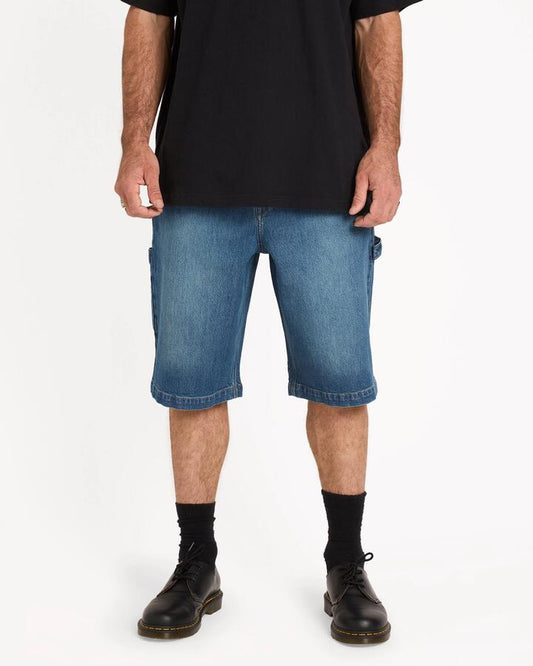 Image of a model wearing Shorts. Productname: volcom - Mens Kraftsman Ii Carpenter Shorts - Park Blue - in Park Blue colour by brand - volcom