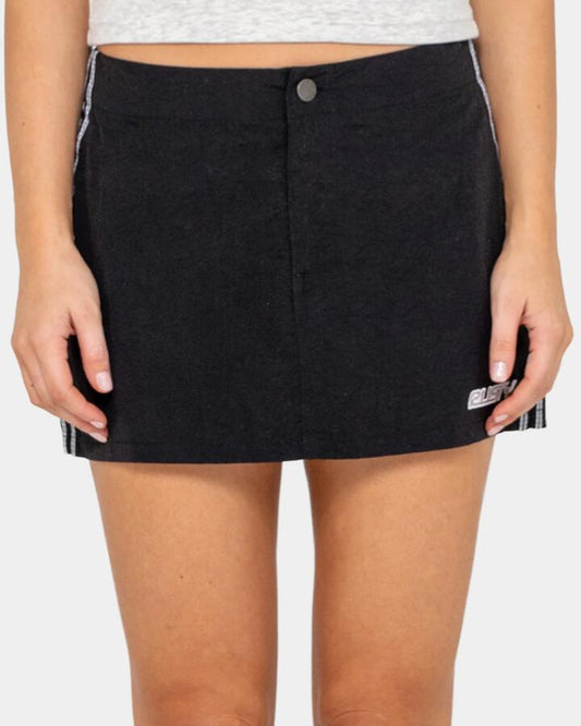Image of a model wearing Skirts. Productname: rusty - Womens Lombardi Nylon Mini Skirt - Black - in Black colour by brand - rusty