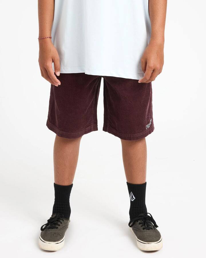 Image of a model wearing Shorts. Product name - Volcom Boys 8-16 Outer Spaced Walkshorts Pistol Punch in Pistol Punch colour by brand - Volcom
