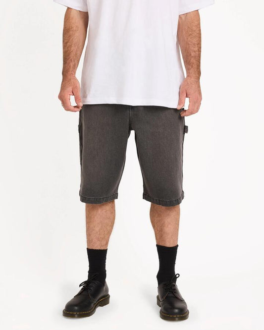 Image of a model wearing Shorts. Productname: volcom - Mens Kraftsman Ii Carpenter Shorts - Black Grey - in Black Grey colour by brand - volcom