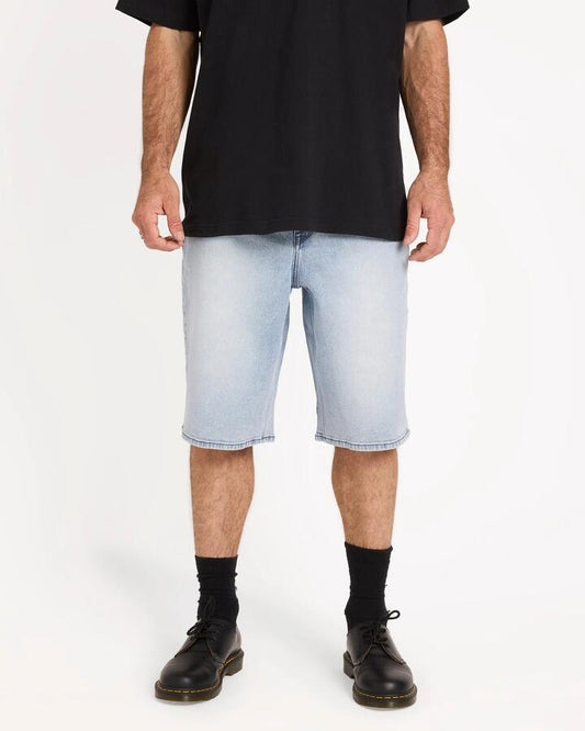 Image of a model wearing Shorts. Productname: volcom - Mens Chillow Denim Shorts - Dirty Cowboy Blues - in Dirty Cowboy Blues colour by brand - volcom
