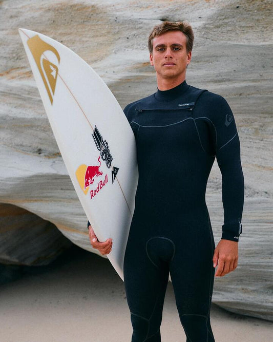 Image of a model wearing Tops. Productname: quiksilver - Mens 4/3Mm Marathon Sessions Chest Zip Wetsuits - Black - in Black colour by brand - quiksilver