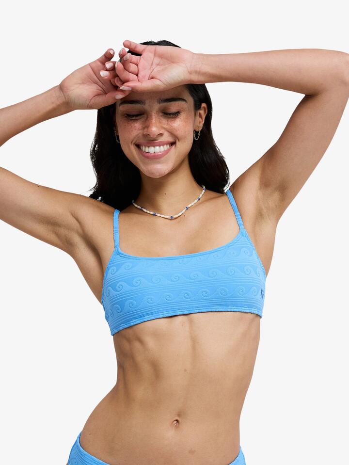 Image of a model wearing Tops. Productname: roxy - Womens Paradise Wave Bralette Bikini Top - Silver Lake Blue Make A Splash - in Silver Lake Blue Make A Splash colour by brand - roxy