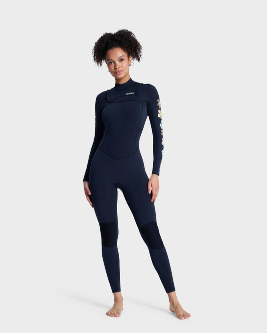 Image of a model wearing Tops. Productname: roxy - Womens 3/2Mm Swell Natural Chest Zip Wetsuit - Flower - in Flower colour by brand - roxy