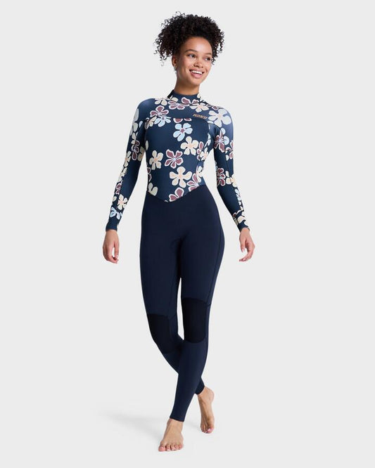 Image of a model wearing Tops. Productname: roxy - Womens 3/2Mm Swell Natural Back Zip Wetsuit - Flower - in Flower colour by brand - roxy