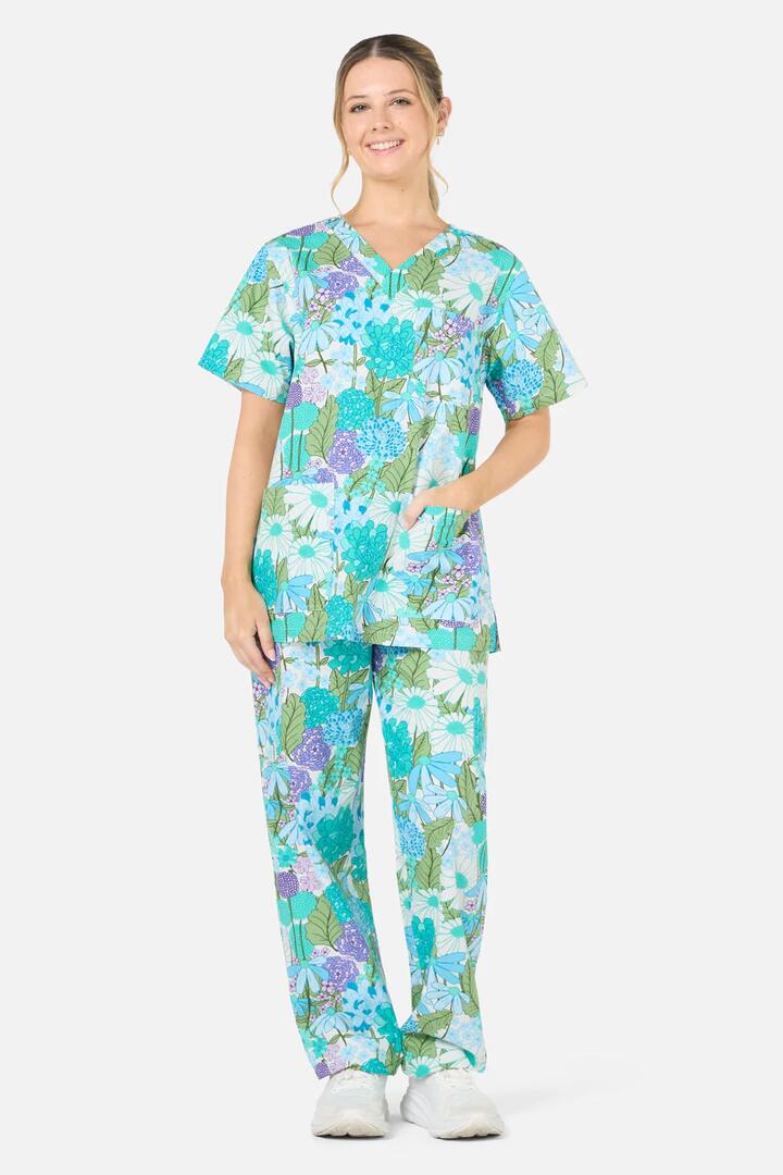 Image of a model wearing Uniforms & Workwear. Productname: Eden Scrub set in Blue colour by brand - Scrubs With Love