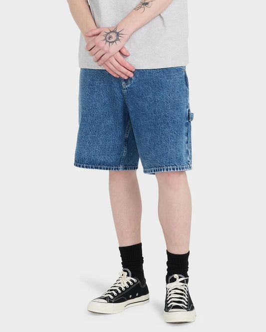 Image of a model wearing Shorts. Productname: element - Mens Big Carpenter Denim Shorts - Mid Used - in Mid Used colour by brand - element