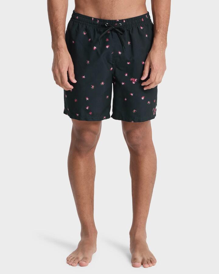 Image of a model wearing Shorts. Product name - Quiksilver Mens Everyday Printed 17" Swim Shorts Black Fallen Blossom in Black Fallen Blossom colour by brand - Quiksilver