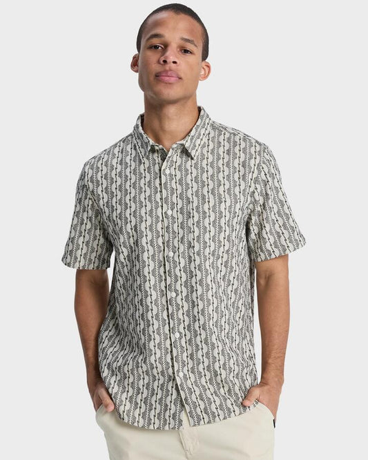 Image of a model wearing Tops. Productname: quiksilver Mens Horizons Short Sleeve Shirt Bone Horizons - in Bone Horizons colour by brand - Quiksilver
