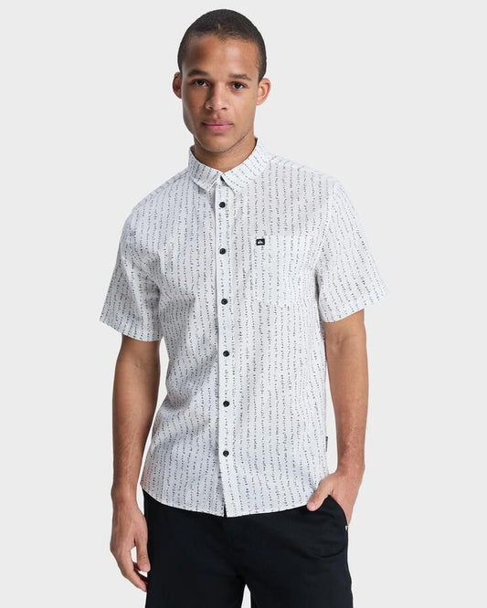 Image of a model wearing Tops. Productname: quiksilver Mens Apero Classic Short Sleeve Shirt Bone White Small Geo 32 - in Bone White Small Geo 32 colour by brand - Quiksilver